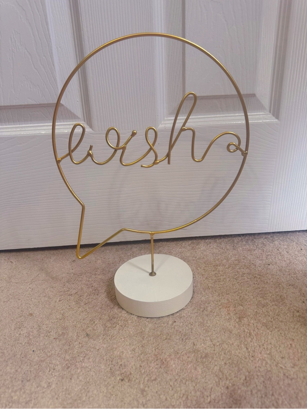 Gold wire wish sign